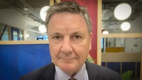 UK information commissioner John Edwards resigns after workplace probe